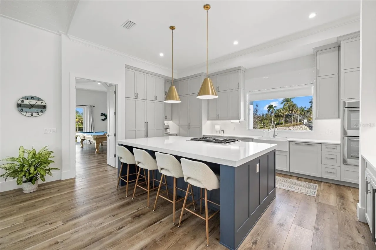 Luxury kitchen interior with island seating and modern design